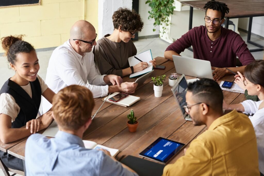 Innovation team collaborating in a workshop — human skills in the age of AI